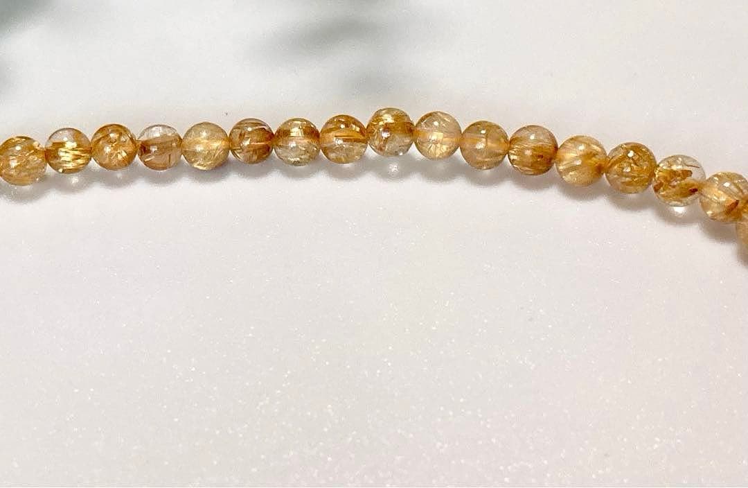 究極品質　超希少幻の逸品　天然石の王者　タイチンルチルキャッツアイの多重編み