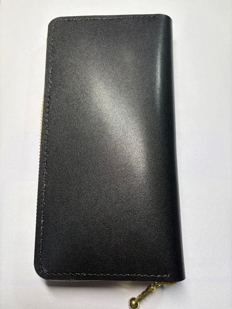 手作りの丸型ファスナー付き財布