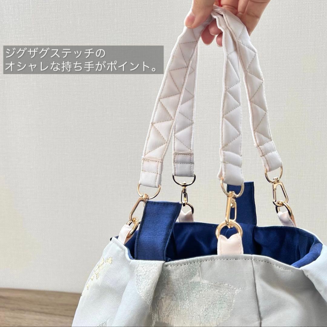 コロンとまるい 薄桃色のリバーシブルバッグ 帯リメイクバッグ 着物 和装バッグ