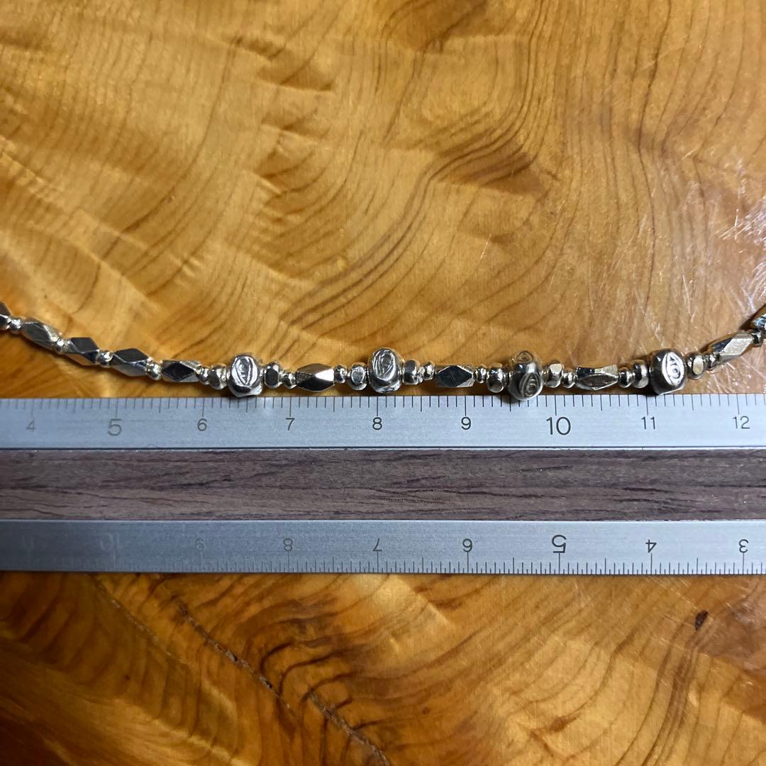 カレンシルバー　ダイヤ型ファセットと眼のソリッドビーズ　ブレスレット