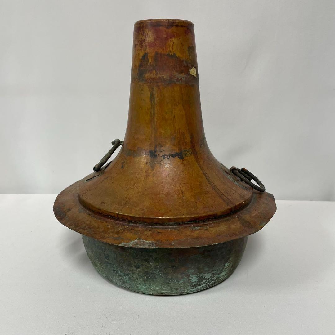 古い銅製円錐形装飾品