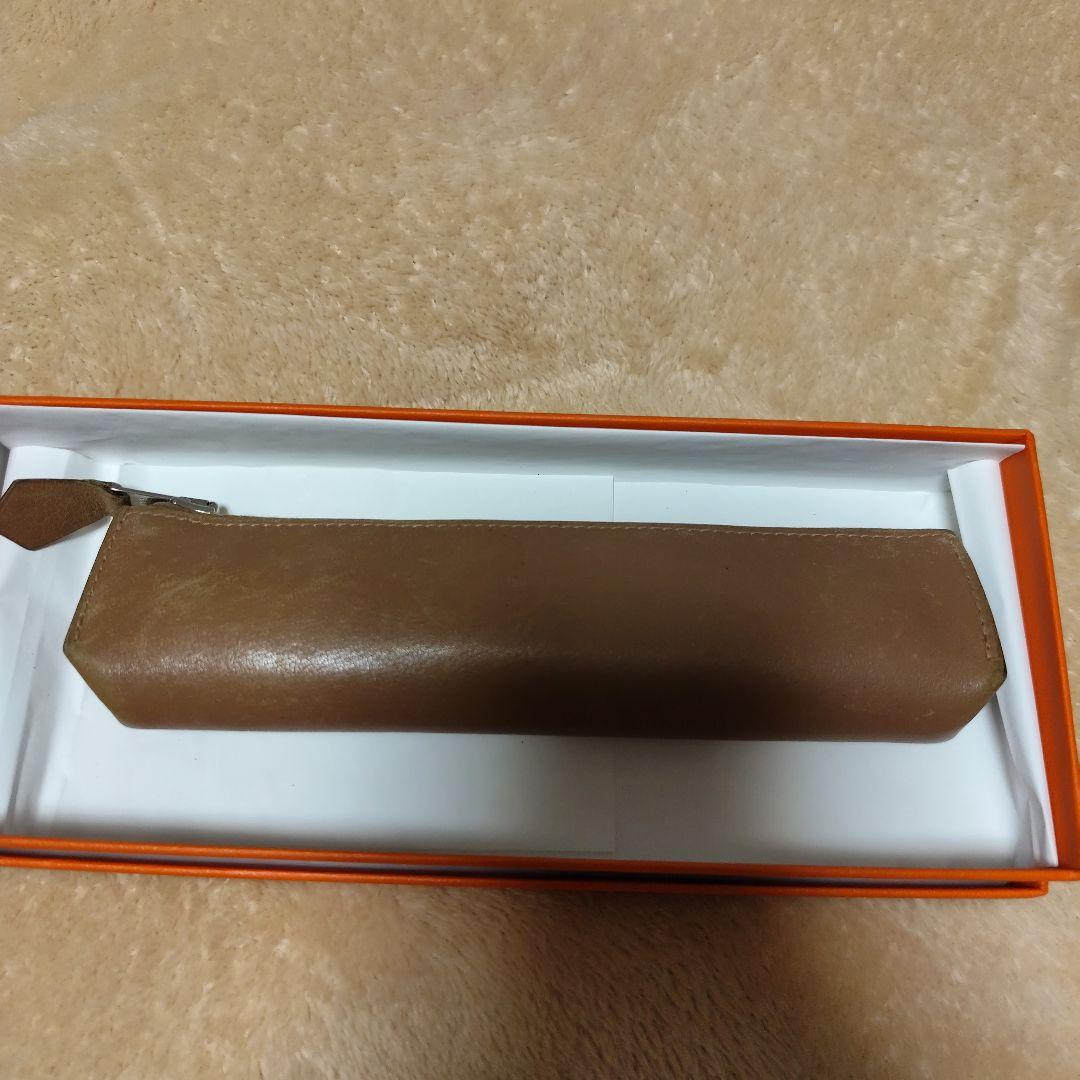 エルメスブラウン セリエボタン　ペンケースピッコロ