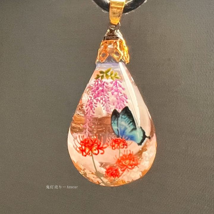 夕焼け空に咲き誇る彼岸花と藤の花とモルフォ蝶の雲レジンオルゴナイト蓄光ネックレス