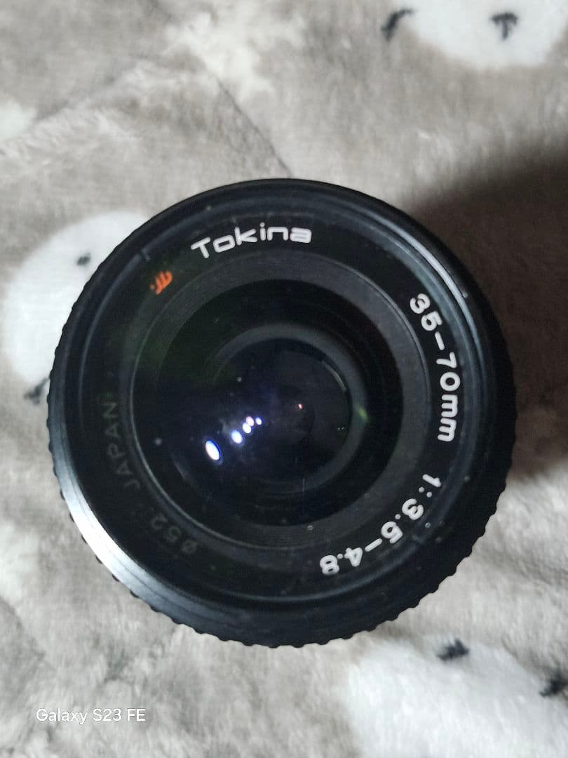 訳あり品Canon T70 一眼レフカメラとSunpakフラッシュ望遠レンズ